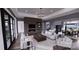 Open living room featuring a modern fireplace, stylish decor, and large windows for natural light at 0 Mineral Ln, Lincolnton, NC 28092