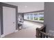 Spacious living area showcasing large windows offering stunning views, and neutral wall coloring at 0 Mineral Ln, Lincolnton, NC 28092