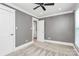 A modern bedroom with recessed lighting and neutral color palette at 1011 Bydeford Ct, Matthews, NC 28105