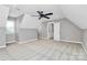 Spacious attic bedroom features recessed lighting and neutral paint at 1011 Bydeford Ct, Matthews, NC 28105