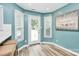 A light-filled breakfast nook offers backyard access and serene views for relaxed dining at 1011 Bydeford Ct, Matthews, NC 28105