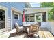 Cozy outdoor deck features comfortable seating and outdoor dining at 1011 Bydeford Ct, Matthews, NC 28105