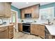 This kitchen features modern appliances, granite countertops, and custom cabinets with ample storage space at 1011 Bydeford Ct, Matthews, NC 28105