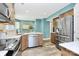 Bright, modern kitchen featuring stainless appliances and ample counter space at 1011 Bydeford Ct, Matthews, NC 28105
