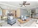 Open floor plan living room showcasing elegant furnishings and connecting to the dining area at 1011 Bydeford Ct, Matthews, NC 28105