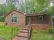 Charming brick home with a welcoming front porch and well-maintained landscaping at 109 Phil Ct, Fort Mill, SC 29715