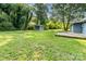 Large, grassy backyard with storage shed and ample space for recreation and entertaining at 112 Lineberger St, Stanley, NC 28164