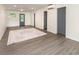 Spacious living room with new floors, fresh paint, and ample natural light at 112 Lineberger St, Stanley, NC 28164