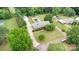 Bird's eye view of lovely home with landscaped yard, pool, and detached garage at 115 Turner St, Lincolnton, NC 28092