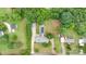 Aerial view of home with pool, detached garage, long driveway, and storage shed at 115 Turner St, Lincolnton, NC 28092