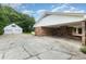 Brick home with carport and detached two car garage and long driveway at 115 Turner St, Lincolnton, NC 28092