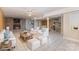 Spacious living room with a fireplace, tile floors, and a partial kitchen area at 115 Turner St, Lincolnton, NC 28092