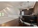 Finished bar with stools, dark wood accents and great lighting at 11841 Churchfield Ln, Charlotte, NC 28277
