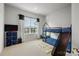 Bright bedroom features a bunk bed with slide, large window, and playroom decor at 120 August Ln, Stallings, NC 28104