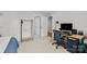 Bright and airy bedroom featuring a dedicated workspace and ample closet space at 120 August Ln, Stallings, NC 28104