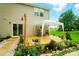Lovely outdoor deck with white canopy, potted plants, and sliding glass door access to home at 124 Vintage Woods Ct, Shelby, NC 28150