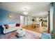 Open-concept space with living room, dining area, and kitchen with modern appliances at 124 Vintage Woods Ct, Shelby, NC 28150