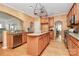 Spacious kitchen features granite countertops, stainless steel appliances, and ample storage at 14904 Rosemary Way Dr, Huntersville, NC 28078