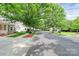Street view shows sidewalks and landscaping enhance neighborhood charm at 14904 Rosemary Way Dr, Huntersville, NC 28078