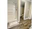 Shower room, with a view to the adjacent toilet at 15 Rose St, York, SC 29745