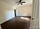 This bedroom has beautiful vinyl floors, a ceiling fan and an open entrance at 16 Cherry St, Albemarle, NC 28001