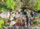 Stunning aerial view showcases lush landscaping, beautiful trees, and charming home at 1601 Wandering Way Dr, Charlotte, NC 28226