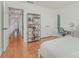 This bedroom offers built-in shelving, access to the hallway, and bright lighting at 1601 Wandering Way Dr, Charlotte, NC 28226