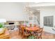 Open dining space with modern lighting and hardwood floors, overlooking a cozy living area, perfect for entertaining and relaxation at 1601 Wandering Way Dr, Charlotte, NC 28226