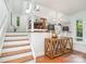 Inviting entryway with skylight, hardwood floors, and stylish decor, seamlessly connecting the dining area and living spaces at 1601 Wandering Way Dr, Charlotte, NC 28226