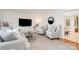 Stylish living area with hardwood floors, comfortable seating, and modern decor, perfect for relaxing and entertaining guests at 1601 Wandering Way Dr, Charlotte, NC 28226