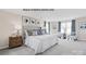 Serene main bedroom with plush carpeting, a large window, and a tufted headboard at 1817 Ab Moore Jr Dr # 3240, Indian Trail, NC 28079