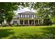 Charming two-story home with inviting front porch and manicured lawn at 19625 Callaway Hills Ln, Davidson, NC 28036