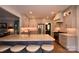 Elegant kitchen with a large island, marble countertops, stainless steel appliances, and modern fixtures at 19625 Callaway Hills Ln, Davidson, NC 28036