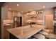 Modern kitchen featuring a large island with seating, updated cabinets, and stainless steel appliances at 19625 Callaway Hills Ln, Davidson, NC 28036
