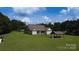 Aerial view of the home, featuring a well maintained lawn and backyard gazebo at 2018 Whiskery Ct, York, SC 29745