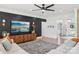 Stylish living room with dark accent wall, modern furniture, and an open view to the foyer at 2018 Whiskery Ct, York, SC 29745