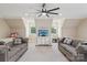 Spacious living area with comfortable seating, a large TV, and great natural light at 2018 Whiskery Ct, York, SC 29745