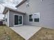 Backyard with a patio, sliding glass doors, and view of the house at 213 J.P. Dr, Albemarle, NC 28001