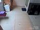 Bathroom being renovated showing flooring, shelving, and storage options at 2194 Sterling Ridge Dr, Newton, NC 28658
