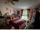 Cozy bedroom featuring a comfortable bed, ample lighting, and stylish décor at 2194 Sterling Ridge Dr, Newton, NC 28658