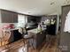 Well-equipped kitchen with dark cabinets and center island at 2194 Sterling Ridge Dr, Newton, NC 28658