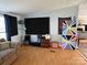 Eclectic living room with musical equipment and ample natural light at 2194 Sterling Ridge Dr, Newton, NC 28658