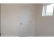 Bedroom featuring a window and a white door, with neutral walls at 222 Harpers Run Ln, Matthews, NC 28104