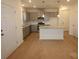 Modern kitchen with gray cabinets, granite countertops, stainless steel appliances, and hardwood floors at 222 Harpers Run Ln, Matthews, NC 28104
