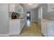 Bright kitchen features neutral walls, checkerboard backsplash, and tile flooring at 24 19Th Nw St, Hickory, NC 28601