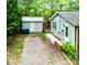 Back of house with shed and driveway at 24 19Th Nw St, Hickory, NC 28601
