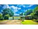 Charming single-story home with an attached garage and a well-maintained lawn and garden in a treed neighborhood at 2405 Forrestbrook Dr, Kannapolis, NC 28083