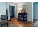 Inviting foyer with elegant table, lamps, and mirror with doorways leading to other rooms at 2405 Forrestbrook Dr, Kannapolis, NC 28083
