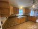 Bright kitchen with stainless steel appliances, granite countertops, and wooden cabinets at 2405 Forrestbrook Dr, Kannapolis, NC 28083