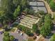 Aerial view of bocce ball and tennis courts in a beautifully landscaped community setting at 26444 Sandpiper Ct, Fort Mill, SC 29707